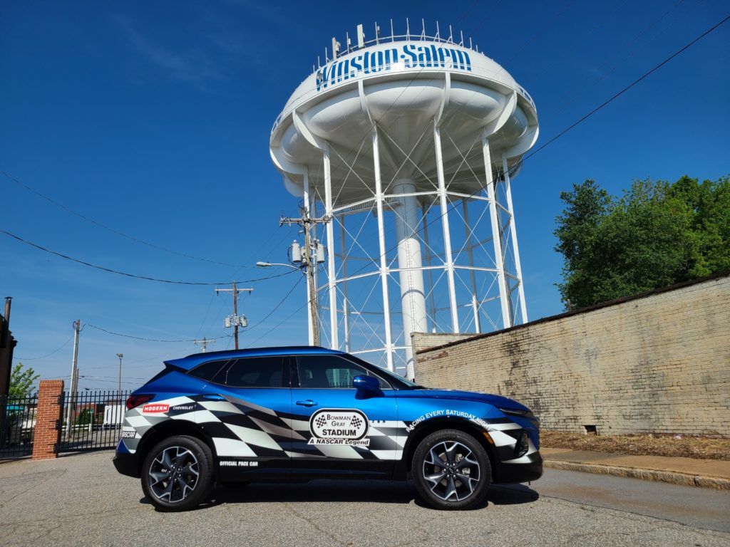 The pace car we wrapped for Bowman Gray Stadium in 2021 sits outside our production space in downtown Winston-Salem, NC. 