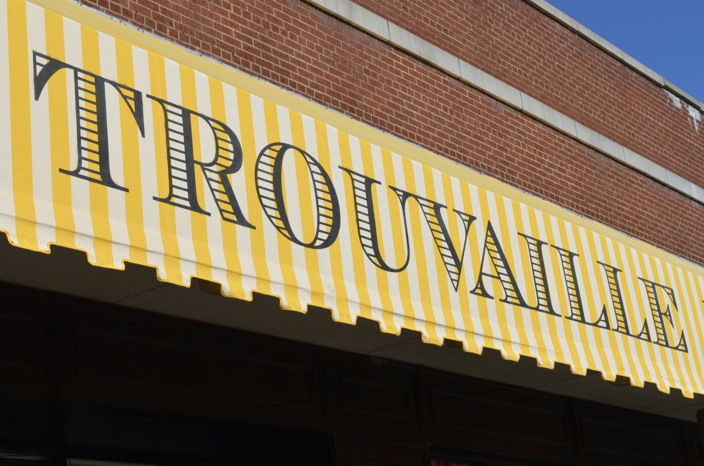 Hand-painted awning for Trouvaille Home.