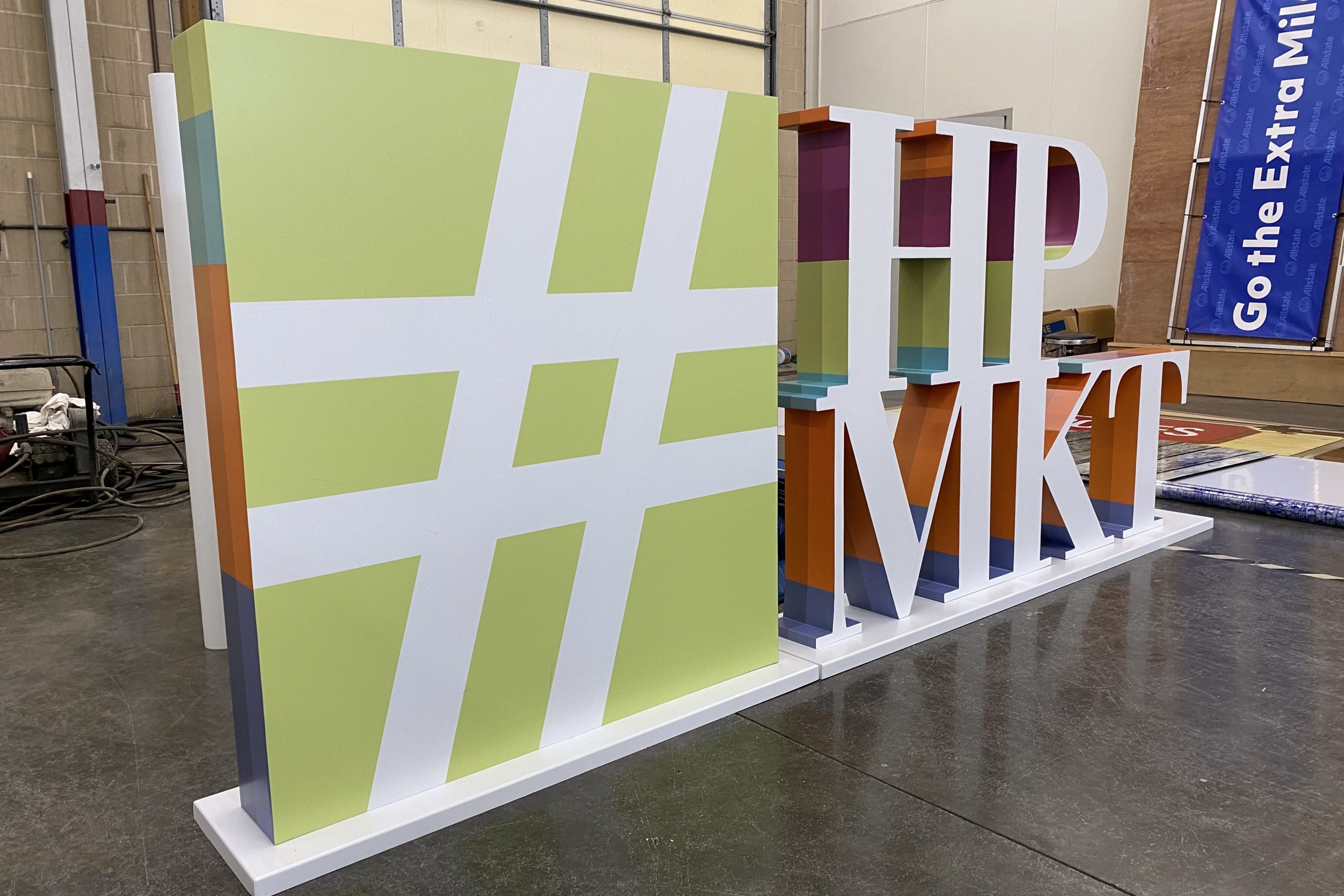 A #HPMKT photo-op sign sits in our fabrication space.