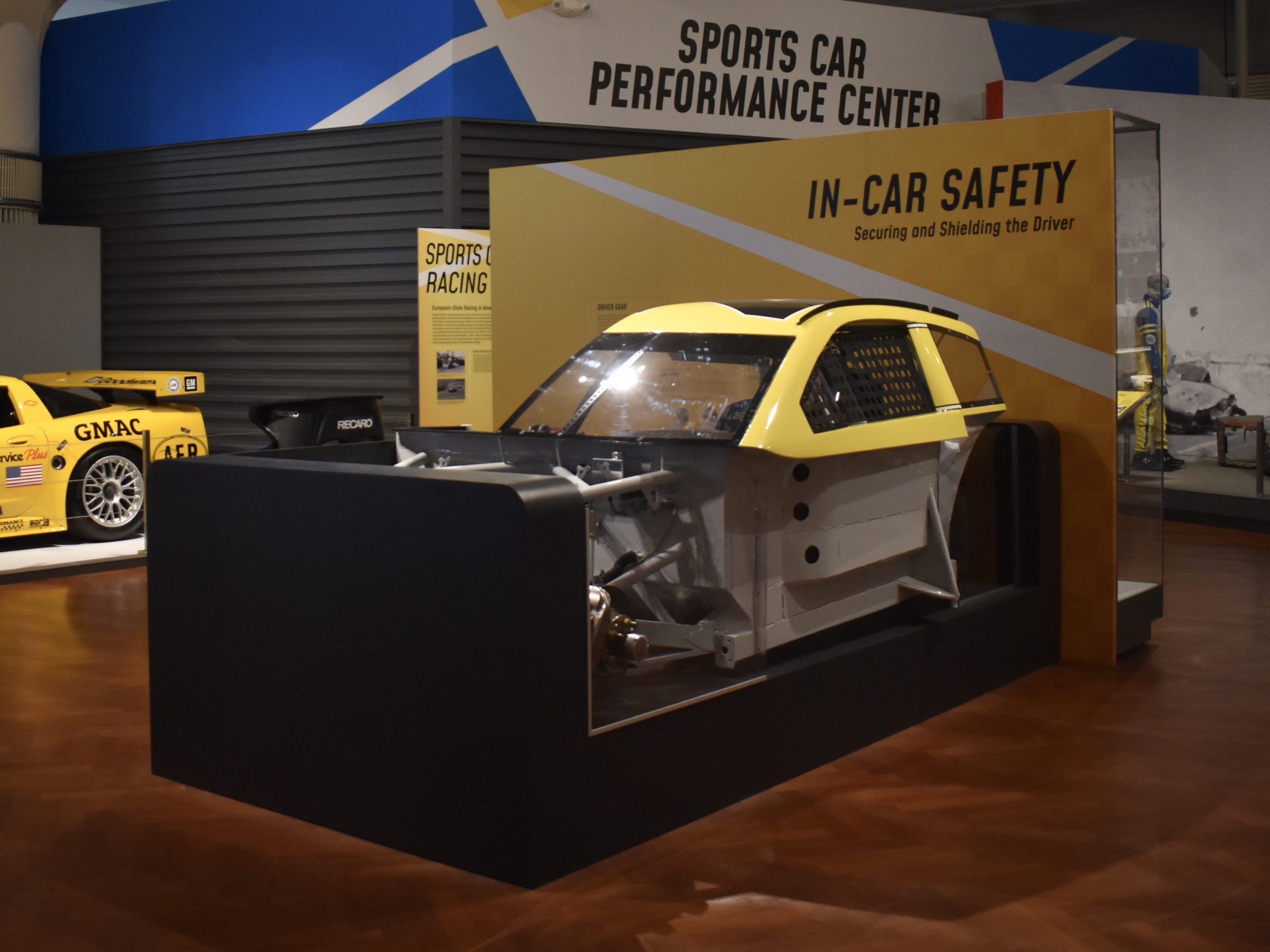 A cut-away NASCAR simulation stock car that we fabricated for kubik maltbie sits in The Henry Ford.
